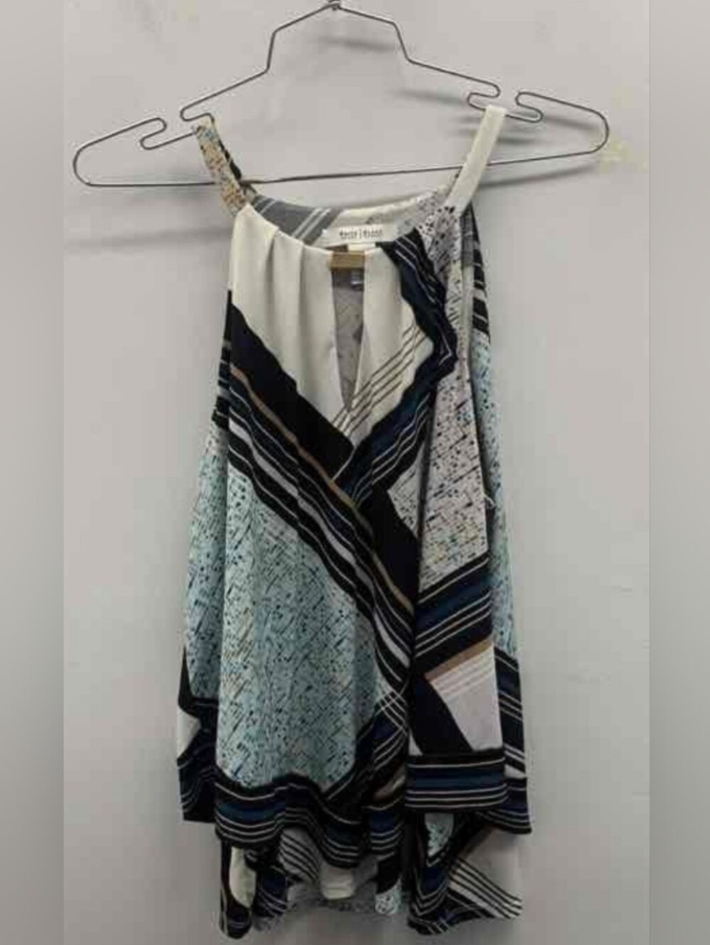 White House Black Market High-Low Blouse Is A Size Large.